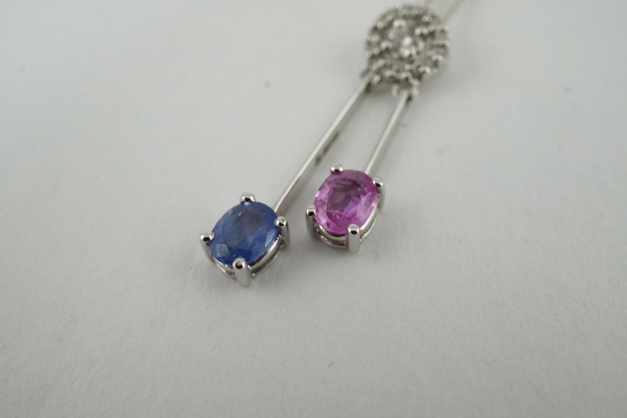 A modern 18k, two colour sapphire and diamond set double drop pendant, 26mm, on a 9ct white gold chain, 38cm, gross weight 2.5 grams. Condition - good